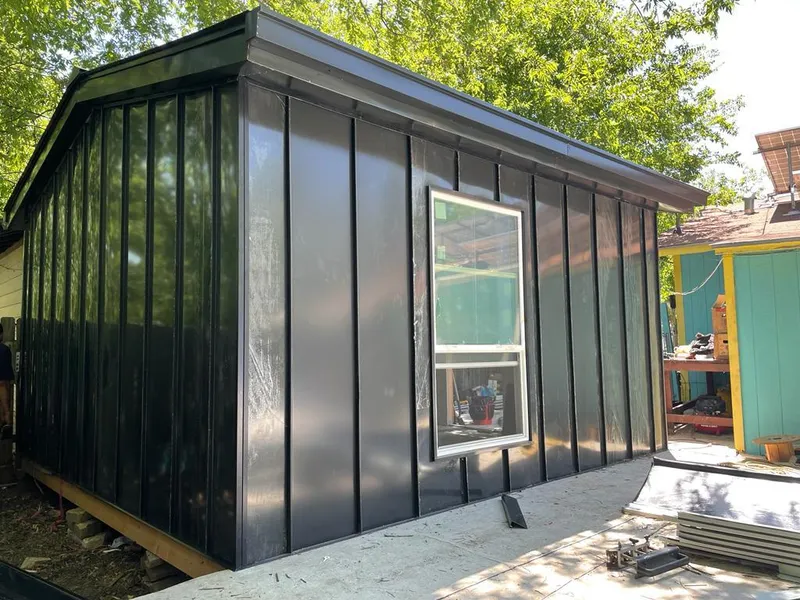 Black standing seam metal wall panels for Metal Roof Installation in Bainbridge